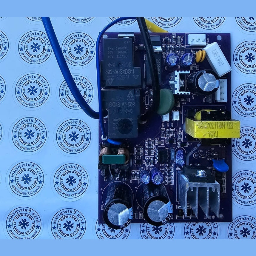 Electronic circuit board with various components on a blue background with circular logos.